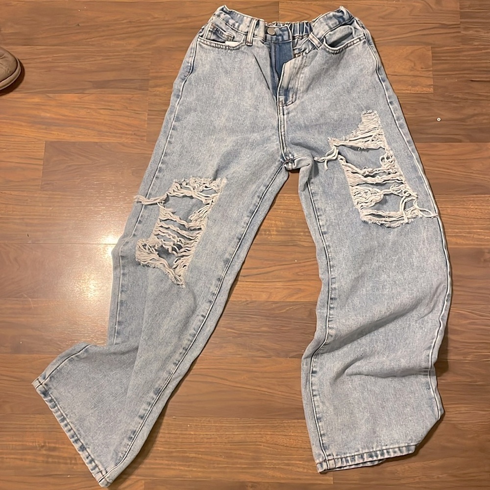 Wide leg ripped jeans.